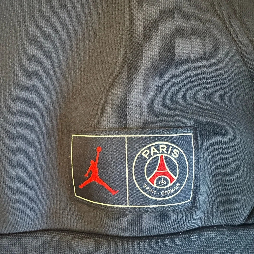 Jordan Navy PSG Hoodie with Red and White Chest Stripe